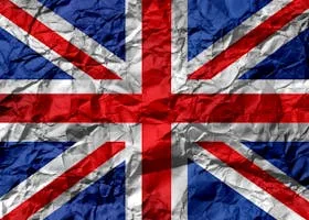 Crumpled texture of the Union Jack flag, symbolizing UK unity and heritage.